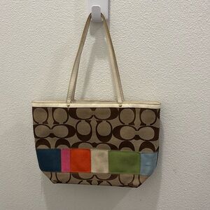 Coach Signature Legacy Stripe bag.